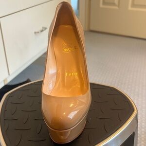 Beige Louboutin  pumps never worn